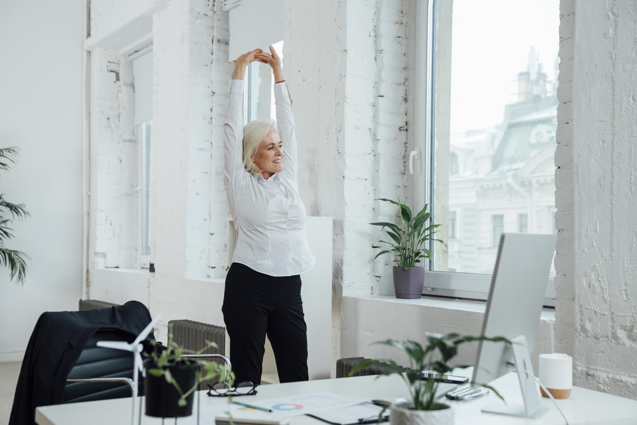 Make sure you get up and stretch or move around, instead of sitting at your desk all day. (Getty Images)