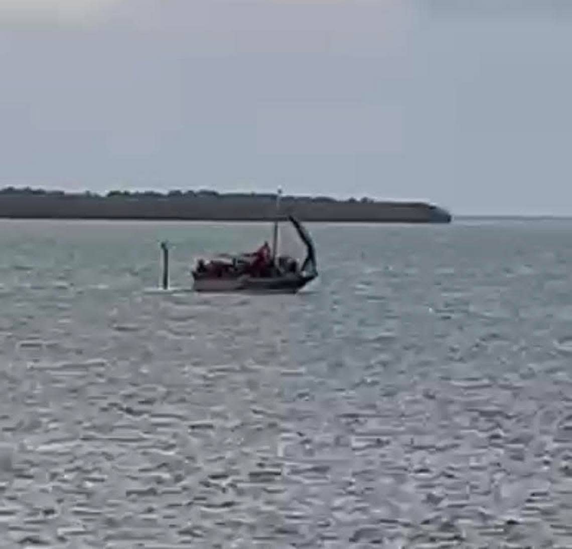 A migrant sailboat approaches the Upper Florida Keys community of Tavernier Thursday morning, Feb. 9, 2023. Frances Cowart