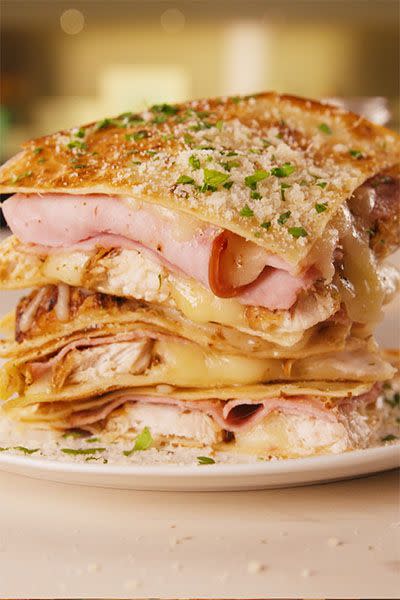 <p>Your taco Tuesday will never be the same after making these quesadillas, featuring sliced ham, mozzarella, garlic powder, and Parmesan.</p><p><em>Get the recipe at <a href="https://www.delish.com/cooking/a19566774/chicken-cordon-bleu-quesadillas-recipe/" rel="nofollow noopener" target="_blank" data-ylk="slk:Delish;elm:context_link;itc:0;sec:content-canvas" class="link ">Delish</a>.</em></p>