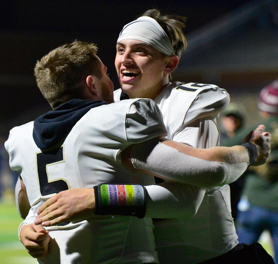 Spartanburg hosted Gaffney in the 5A Upper State Championship game in high school football at Spartanburg High School on Friday, Nov. 26, 2021.  Gaffney's Landon Bullock (5) and Gaffney's Grayson Loftis (12) react to Gaffney beating Spartanburg 56-31.