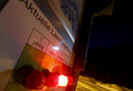 An avalanche warning sign is pictured in Wattental valley in Austria's skiing region of Tyrol February 6, 2016. REUTERS/Dominic Ebenbichler
