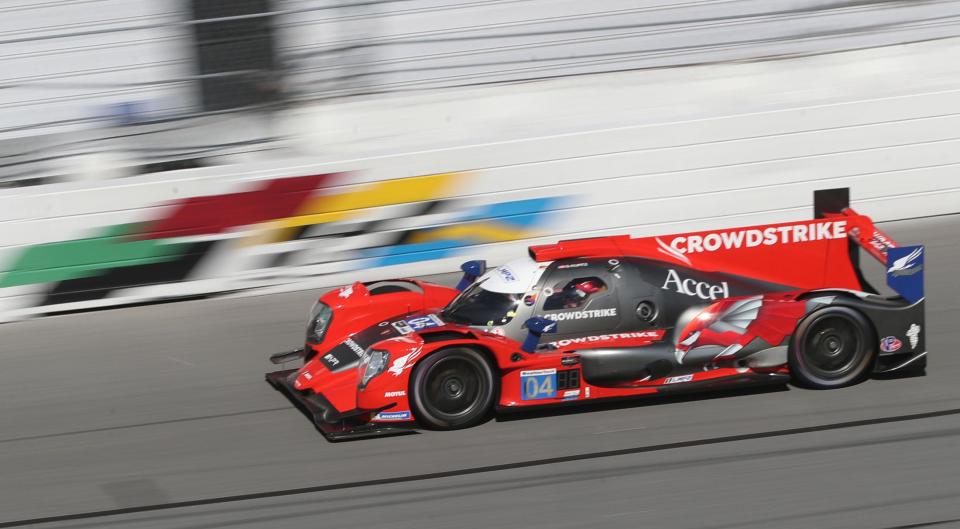 The No. 04 Oreca LMP2 07 flies through the trioval, Wednesday December 6, 2023, as IMSA teams take to Daytona International Speedway for the first of four days of testing for the Rolex 24.