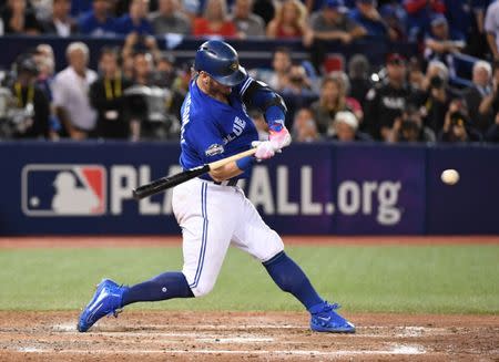 Toronto Blue Jays Josh Donaldson is congratulated after hitting a