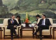 BEIJING, CHINA - MAY 3: U.S. Treasury Secretary Timothy Geithner (L) talks with China's Vice Premier Li Keqiang (R) during a meeting at the Great Hall of the People on May 4, 2012 in Beijing. Hillary Clinton is in China for bilateral talks and has called on China to protect human rights. Chinese activist Chen Guangcheng has aksed to meet with the U.S Secretary of State to discuss his situation. (Photo by Jason Lee/Pool/Getty Images)