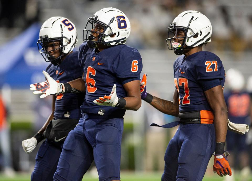 Charles Henderson's Zion Grady (6) celebrates a stop during the AHSAA Super 7 football Class 5A state championship at Jordan-Hare Stadium in Auburn, Ala., on Thursday, Dec. 1, 2022. Ramsay leads Charles Henderson 20-13.