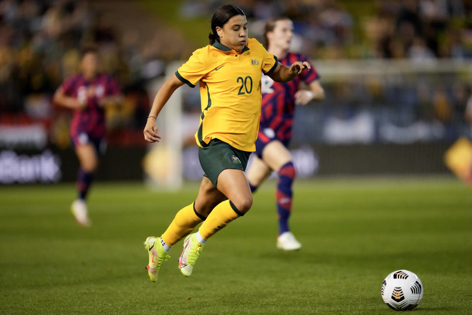 Matilda's Sam Kerr runs with the ball during the international women's soccer match between the United States and Australia in Newcastle, Australia, Tuesday, Nov. 30, 2021. (AP Photo/Mark Baker)