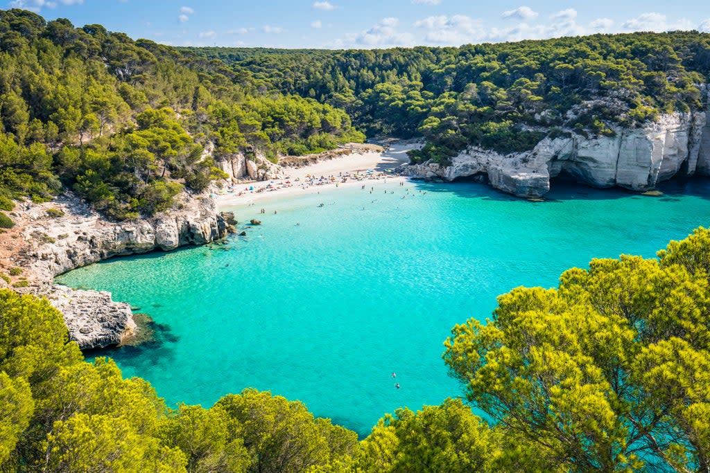 Cala Mitjana beach in Menorca (Getty Images/iStockphoto)