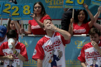 <p>Joey Chestnut wins the annual Nathan’s Hot Dog Eating Contest, setting a new world record by eating 74 hot dogs in Brooklyn, New York City, U.S., July 4, 2018. (Photo: Stephen Yang/Reuters) </p>