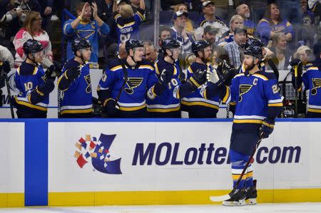 Nov 4, 2017; St. Louis, MO, USA; St. Louis Blues defenseman Alex Pietrangelo (27) is congratulated by teammates after his line scored a goal during the third period against the Toronto Maple Leafs at Scottrade Center. Mandatory Credit: Jeff Curry-USA TODAY Sports