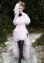 <b>Chanel SS13:</b> Feathers added to the dreamy, romantic theme of Lagerfield's show.<br><br>© Reuters
