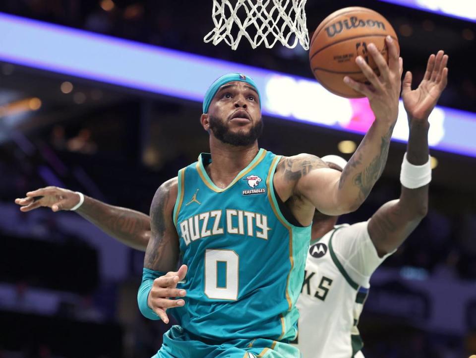 Charlotte Hornets forward Miles Bridges drives to the basket on a shot attempt during second-half action against the Milwaukee Bucks on Friday, November 17, 2023 at Spectrum Center in Charlotte, NC. The Bucks defeated the Hornets 130-99.