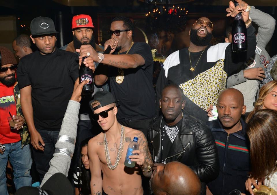 We know Justin Bieber is a standout in the music world, but sometimes he just plain stands out. Like when he randomly takes off his shirt — as he did here while partying with Diddy in Atlanta — despite everyone around him being fully clothed. (Photo: Prince Williams/FilmMagic)