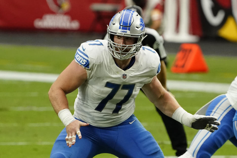 FILE - Detroit Lions center Frank Ragnow (77) plays during an NFL football game against the Arizona Cardinals in Glendale, Ariz., in this Sunday, Sept. 27, 2020, file photo. The Detroit Lions have signed Pro Bowl center Frank Ragnow to a $54 million, four-year extension that keeps him under contract through the 2026 season. The team announced the deal Friday, May 7, 2021, investing in one of the franchise’s building blocks under general manager Brad Holmes and coach Dan Campbell.(AP Photo/Rick Scuteri)