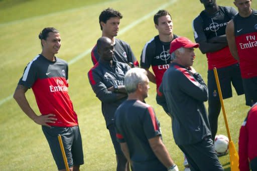 Paris Saint-Germain's Swedish forward Zlatan Ibrahimovic (L) takes part in a training session, on August 9, at the Camp des loges, in Saint-Germain-en-Laye, outside Paris, two days before their first Ligue 1 match of the 2012-2013 season