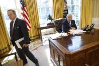 White House Communications Director and spokesman Sean Spicer (L) stands with U.S. President Donald Trump at the conclusion of an interview with Reuters in the Oval Office at the White House in Washington, U.S. February 23, 2017. REUTERS/Jonathan Ernst