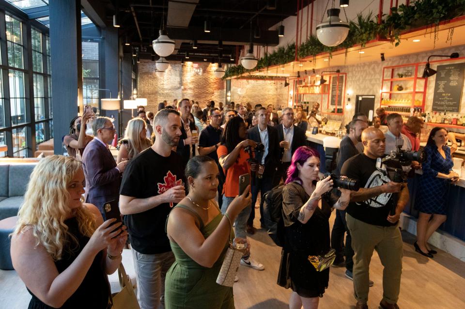 People watch speeches during the Hyatt Caption grand opening ceremony Thursday, July 14, 2022, in Memphis.