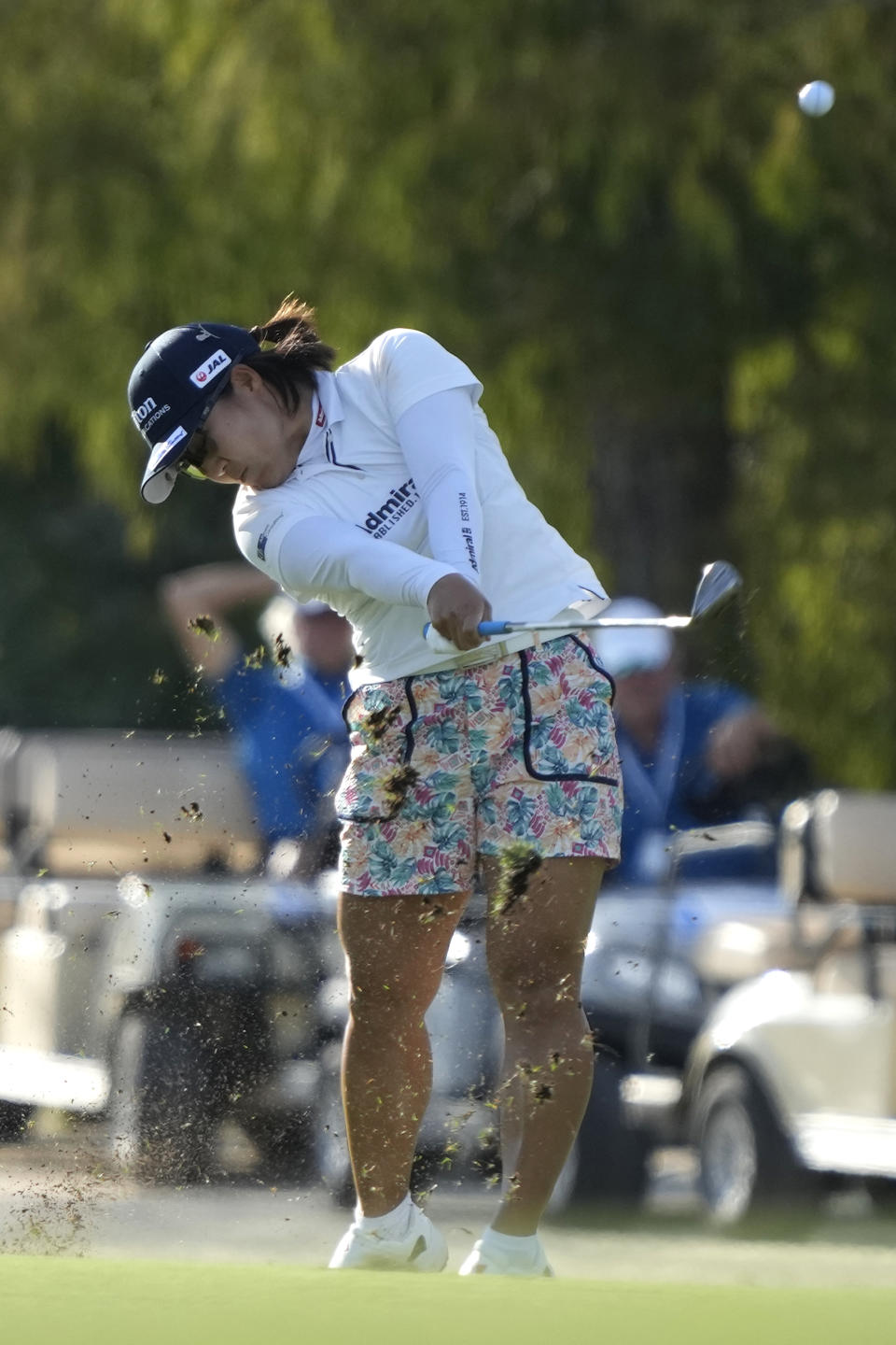 Nasa Hataoka, of Japan, hits from the 13th fairway during the third round of the LPGA CME Group Tour Championship golf tournament, Saturday, Nov. 18, 2023, in Naples, Fla. (AP Photo/Lynne Sladky)