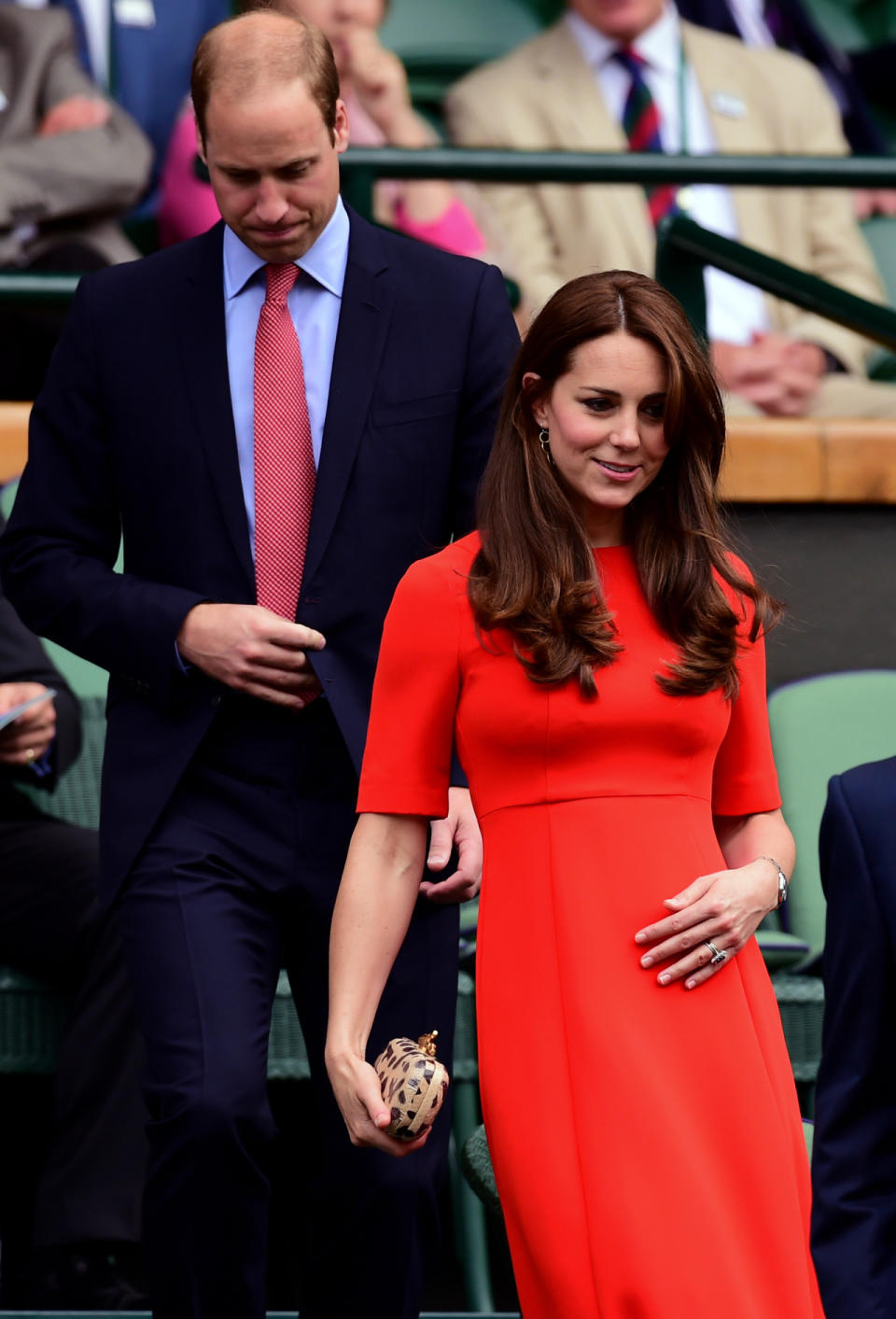 <p>Kate’s Wimbledon outfit consisted of a bright red dress by royal favourite, L.K. Bennett, and Diane von Furstenberg’s leopard print clutch. </p><p><i>[Photo: PA]</i></p>