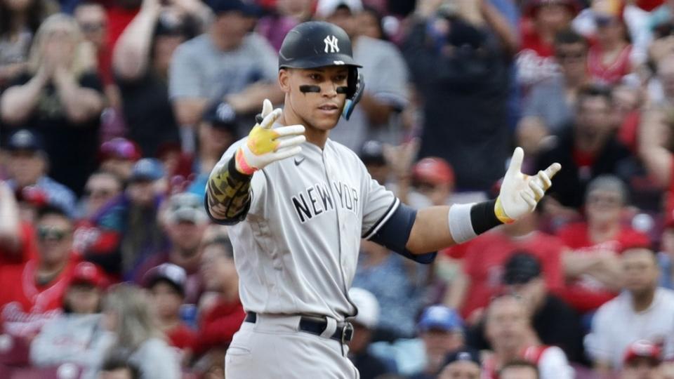 May 20, 2023; Cincinnati, Ohio, USA; New York Yankees designated hitter Aaron Judge (99) reacts a first base after hitting an RBI single against the Cincinnati Reds during the tenth inning at Great American Ball Park. Mandatory Credit: David Kohl-USA TODAY Sports