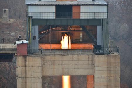 North Korean leader Kim Jong Un watched the ground jet test of a Korean-style high-thrust engine newly developed by the Academy of the National Defence Science in this undated picture provided by KCNA in Pyongyang on March 19, 2017. KCNA/via Reuters