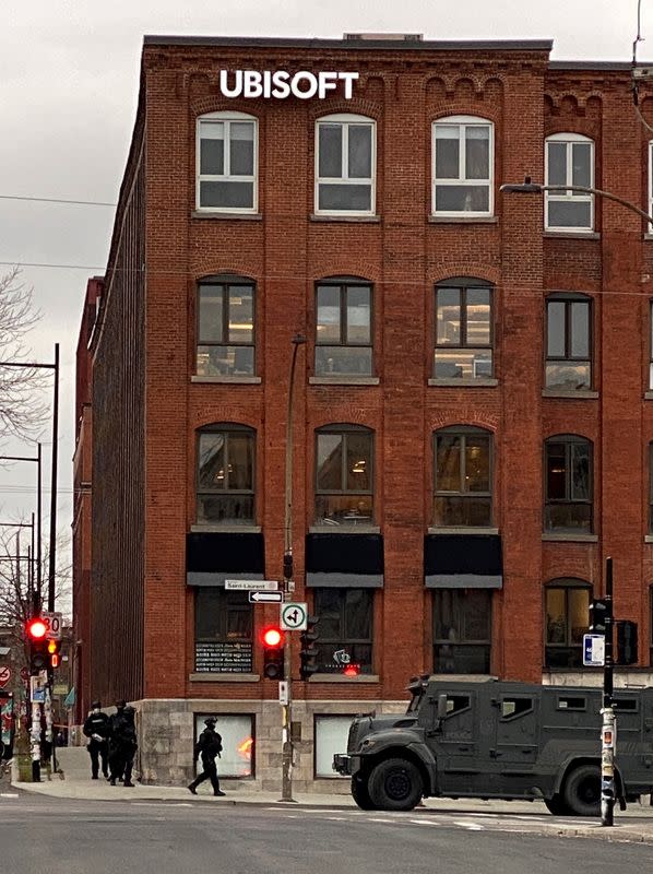 Police maintain a security cordon after media reports of a hostage incident at the offices of gaming software developer Ubisoft in Montreal