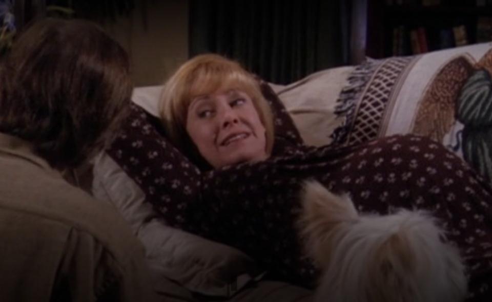 Annie lying on the couch pregnant with twins on "7th Heaven"