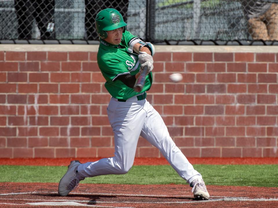 St. Mary's Ben Gaff hits a single during a varsity baseball game against Berkeley at St. Mary's in Stockton, April 24, 2021.