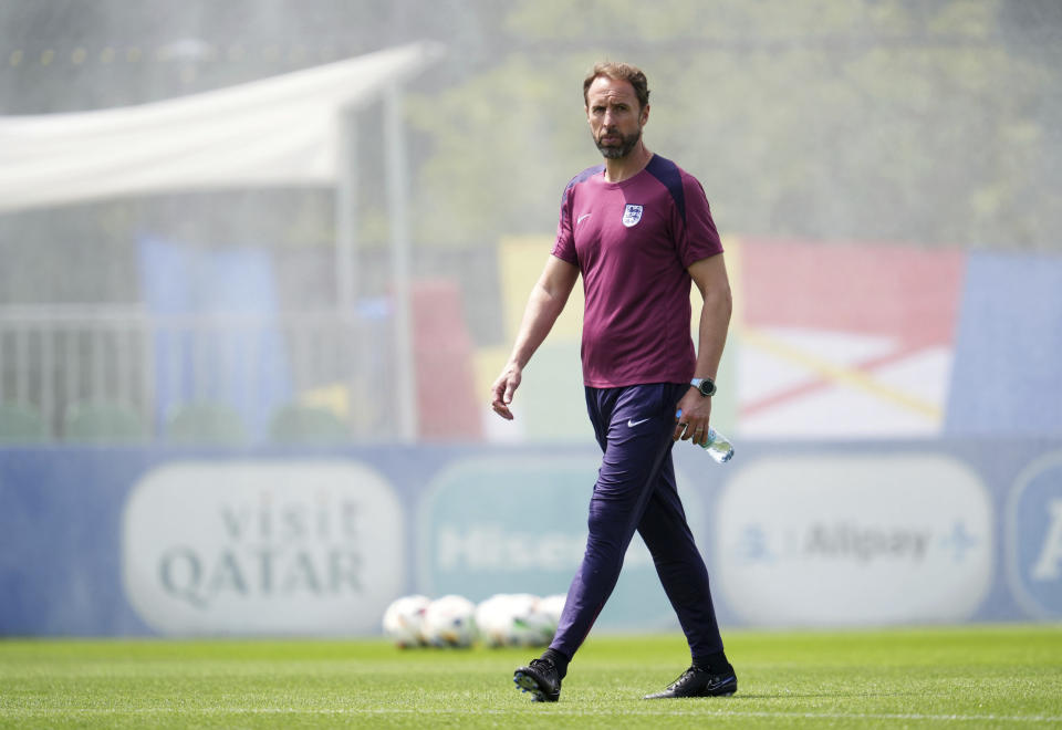 England manager Gareth Southgate during a training session at the Spa & Golf Resort Weimarer Land in Blankenhain, Germany, Saturday June 29, 2024. Gareth Southgate was credited with making England fans fall back in love with their national soccer team. Now many are turning on him. Southgate has been a largely unifying force for the national team during a period of upheaval and uncertainty in English politics and culture, but after nearly eight years and four major tournaments, the European Championship appears to signal a shift in opinion toward him. (Adam Davy/PA via AP)