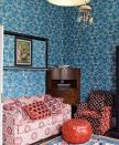 <br>The eclectic style carries throughout the home with the use of clashing prints.