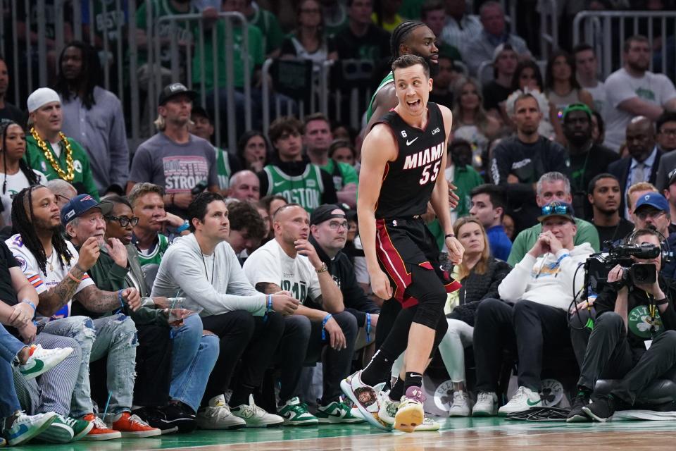 Heat forward Duncan Robinson reacts after making a 3-pointer against Celtics guard Jaylen Brown during the fourth quarter of Game 7 of the Eastern Conference finals at TD Garden in Boston on May 29, 2023.