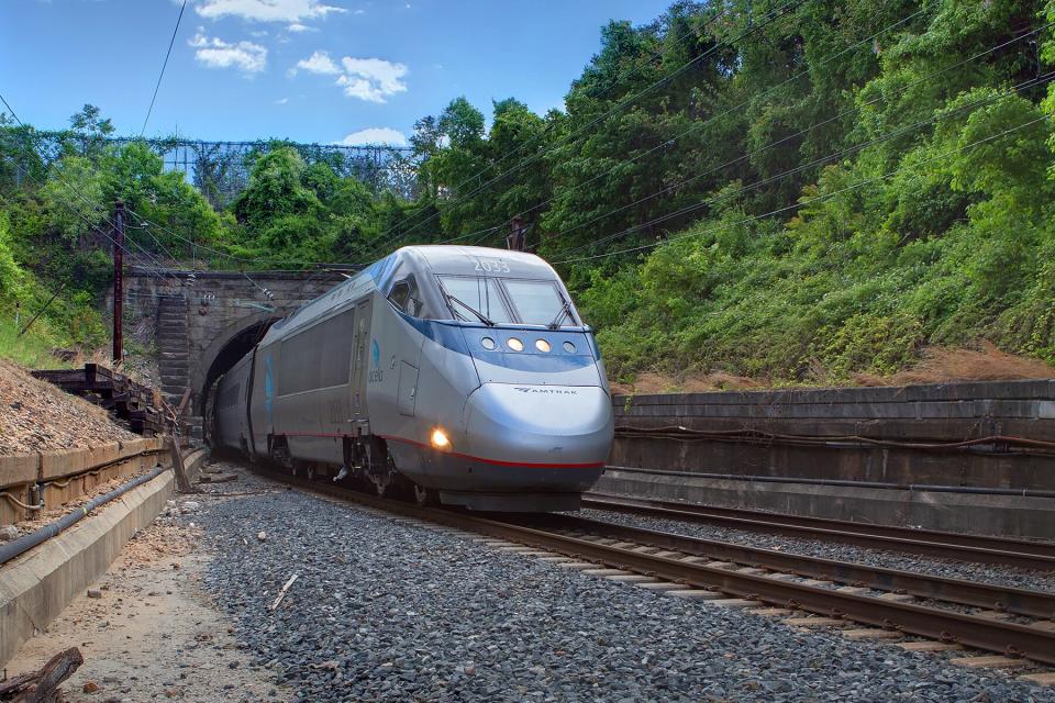 An Acela train emerges from the B&amp;P Tunnel in Baltimore.