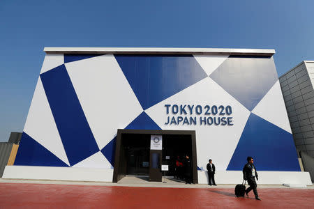 A visitor leaves after attending the Tokyo 2020 Japan House during a media preview in Gangneung, South Korea, February 8, 2018. REUTERS/Jorge Silva