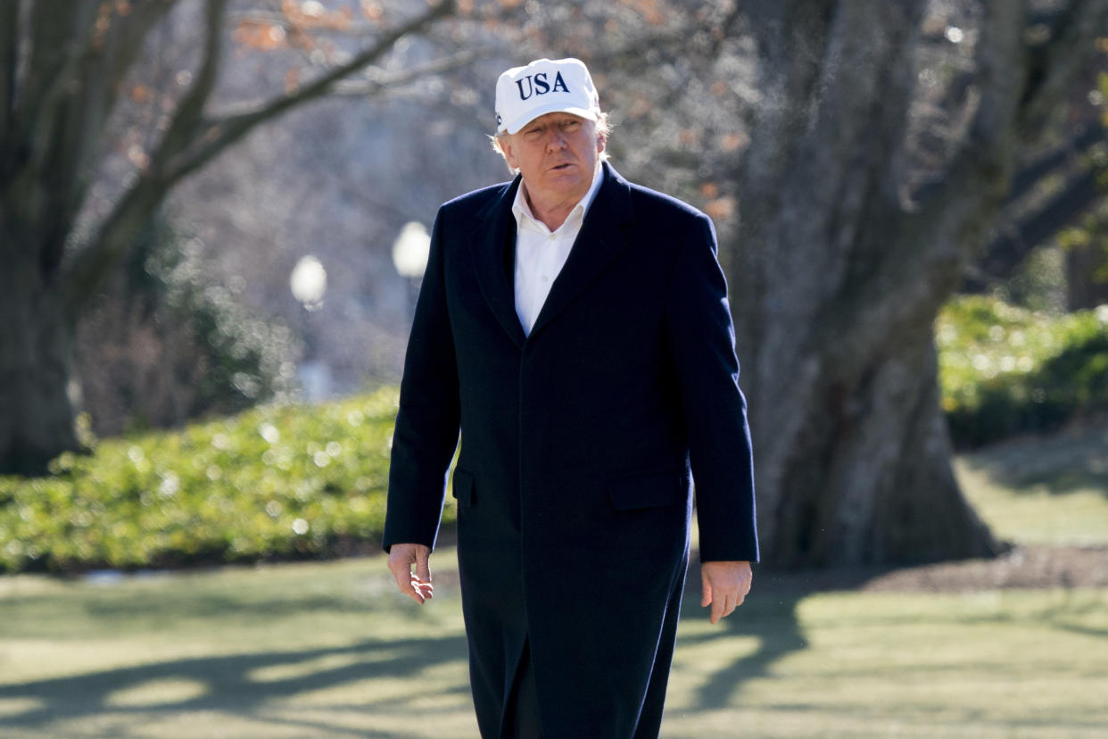 President Trump walks across the South Lawn as he arrives at the White House after traveling from Camp David, Md. (Photo: Andrew Harnik/AP)