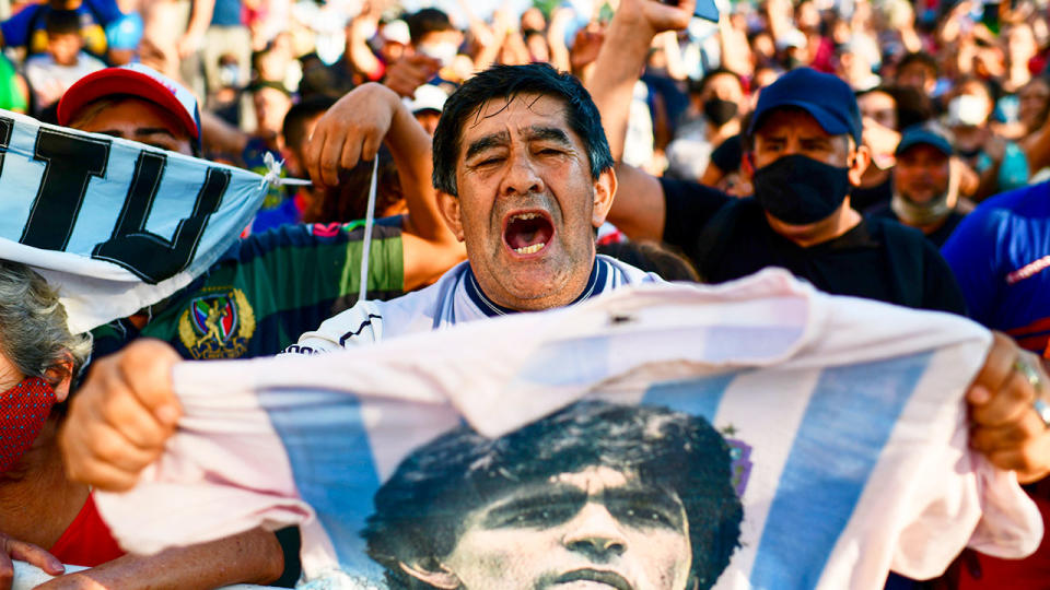 Pictured here, devastated crowds pay their respect to the legendary Maradona.