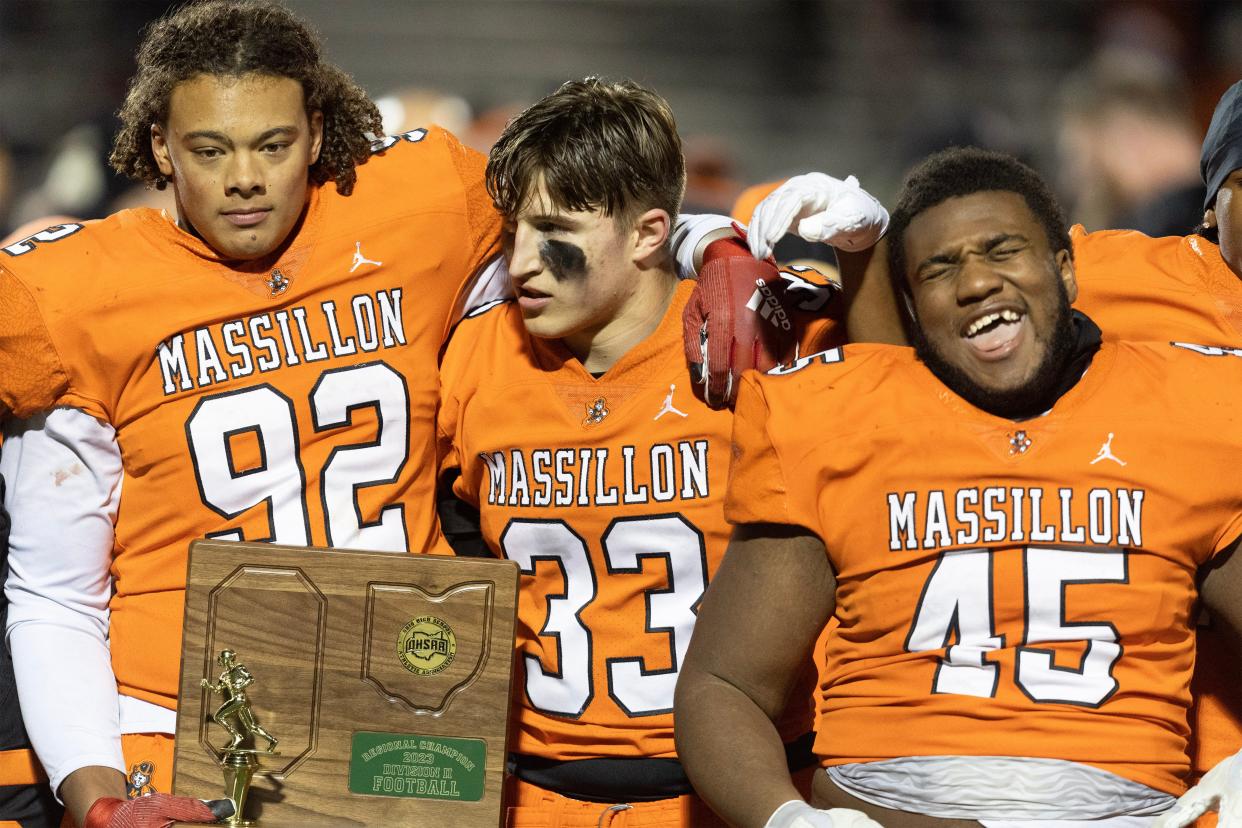 Massillon's Chase Bond (92), Cody Fair (33) and Michael Wright Jr. (45) are part of a defense that allows 33.3 yards rushing per game.