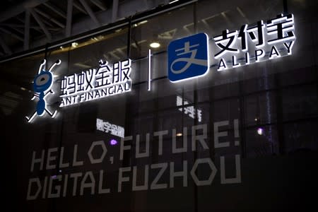 Logo of Ant Financial Services Group is seen next to a logo of Alipay at the Digital China exhibition in Fuzhou, Fujian