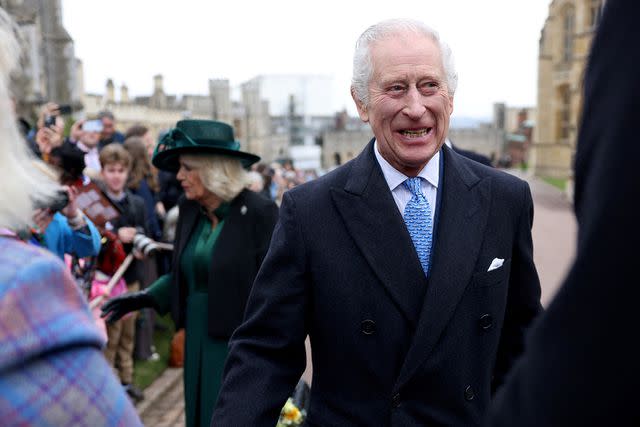 <p>HOLLIE ADAMS/POOL/AFP via Getty Images</p> Queen Camilla and King Charles after Easter church on March 31, 2024