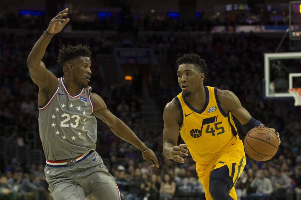 Donovan Mitchell drives on Jimmy Butler during the Utah Jazz’s loss to the Philadelphia 76ers. (Getty)