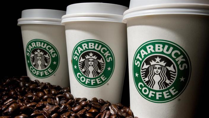 With more than 20,000 stores spread across 65 countries, Starbucks has all but redefined coffee and the coffeehouse experience. Photo: Getty Images