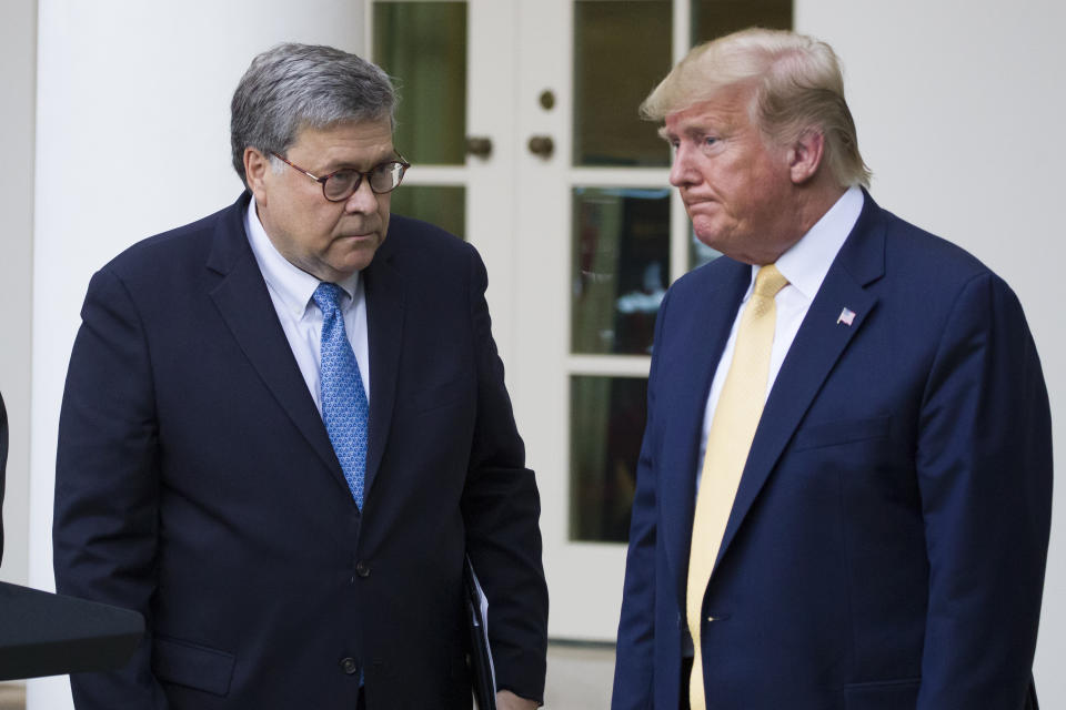 FILE - In this July 11, 2019, file photo, Attorney General William Barr, left, and President Donald Trump turn to leave after speaking in the Rose Garden of the White House, in Washington. Attorney General William Barr took a public swipe Thursday at President Donald Trump, saying that the president’s tweets about Justice Department prosecutors and cases “make it impossible for me to do my job.” Barr made the comment during an interview with ABC News just days after the Justice Department overruled its own prosecutors. they had initially recommended in a court filing that President Donald Trump’s longtime ally and confidant Roger Stone be sentenced to 7 to 9 years in prison. But the next day, the Justice Department took the extraordinary step of lowering the amount of prison time it would seek for Stone. (AP Photo/Alex Brandon, File)