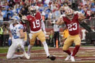San Francisco 49ers running back Christian McCaffrey celebrates after scoring against the Detroit Lions during the first half of the NFC Championship NFL football game in Santa Clara, Calif., Sunday, Jan. 28, 2024. (AP Photo/Godofredo A. Vasquez)