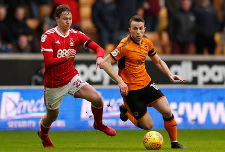 Soccer Football - Championship - Wolverhampton Wanderers vs Nottingham Forest - Molineux Stadium, Wolverhampton, Britain - January 20, 2018 Nottingham Forest's Kieran Dowell in action with Wolves' Diogo Jose Teixeira Da Silva Action Images/Andrew Boyers