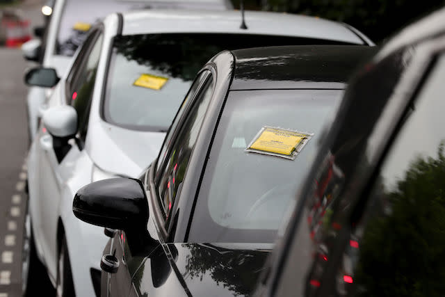 EMBARGOED TO 0001 MONDAY OCTOBER 2 File photo dated 19/07/17 of penalty charge notices affixed to several cars, as up to 17\% of parking spaces on UK streets could be freed up if drivers stopped parking badly, it has been estimated.