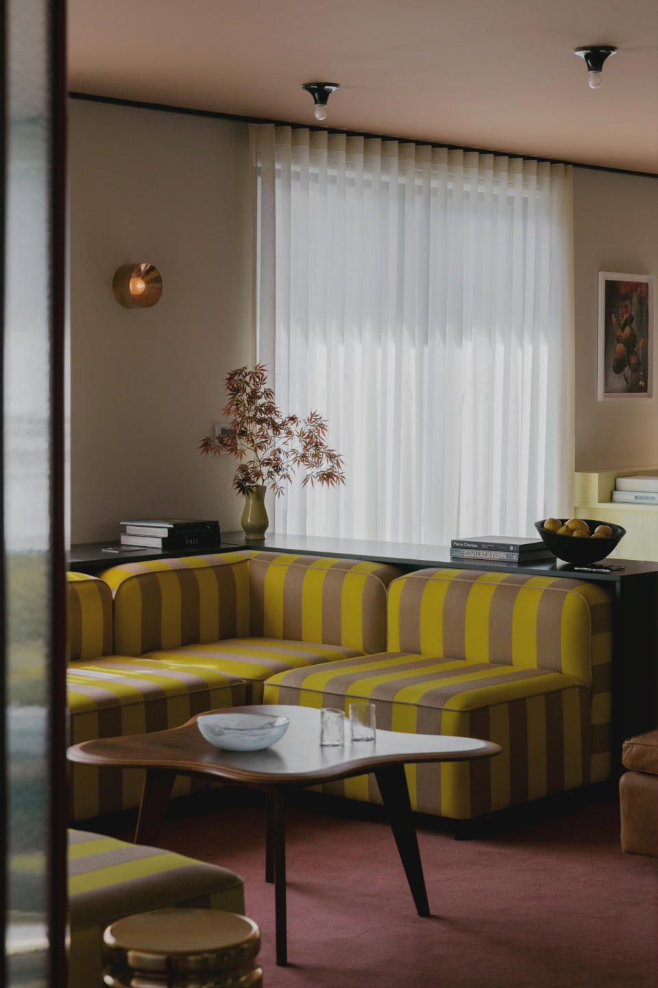 A yellow and grey striped couch