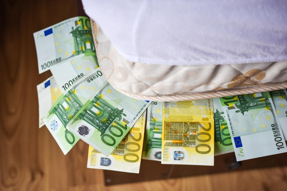Euro  cash savings under the bed mattress