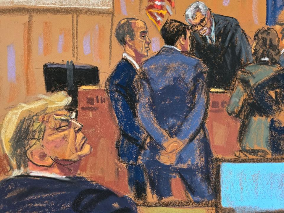 A courtroom sketch depicts lawyers meeting with Judge Juan Merchan as Donald Trump watches during his hush money trial in Manhattan on May 20. (REUTERS)