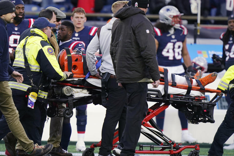 Cleveland Browns cornerback is wheeled off the field on a stretcher after an injury during the second half of an NFL football game against the New England Patriots, Sunday, Nov. 14, 2021, in Foxborough, Mass. (AP Photo/Steven Senne)