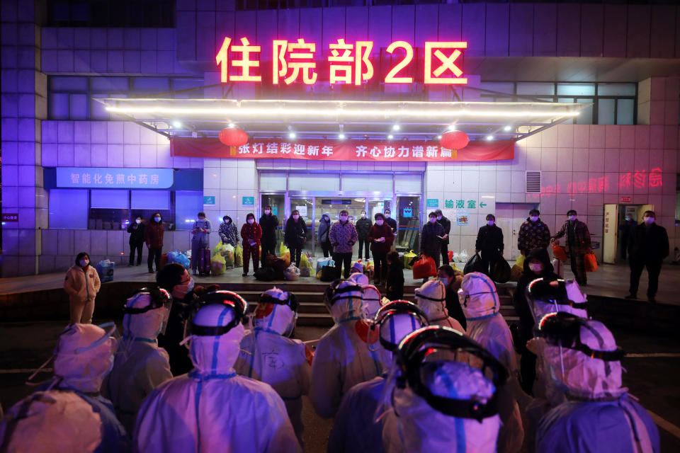 Medical workers prepare to transfer Covid-19 patients in Wuhan in central China's Hubei province on March 3, 2020.  (AFP - Getty Images)