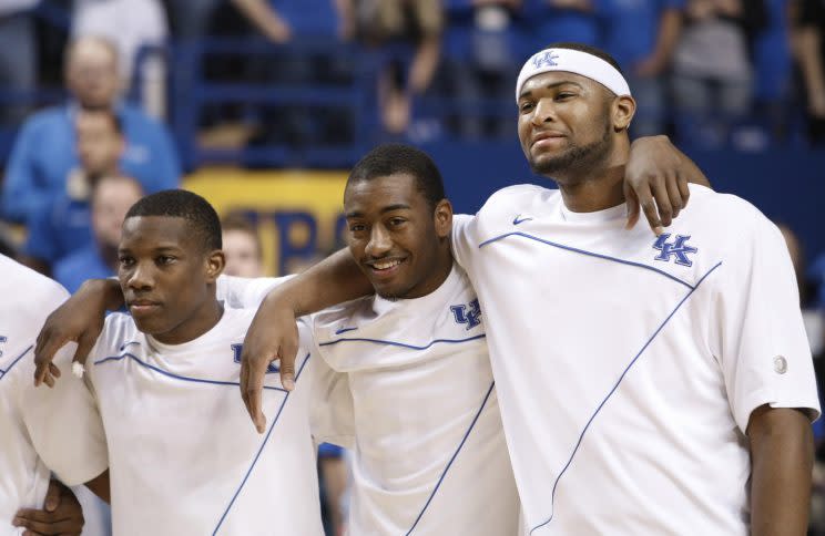 Former Kentucky teammates (from left) Eric Bledsoe, John Wall and DeMarcus Cousins would like to play together again. (AP)