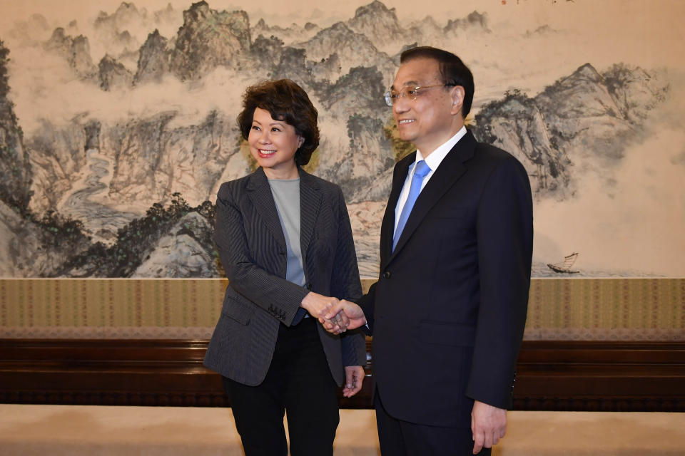 BEIJING, CHINA - APRIL 26:  U.S. Secretary of Transportation Elaine Chao (L) shakes hands with Chinese Premier Li Keqiang before a meeting at the Zhongnanhai Leadership Compound on April 26, 2018 in Beijing, China. (Photo by Naohiko Hatta - Pool /Getty Images)